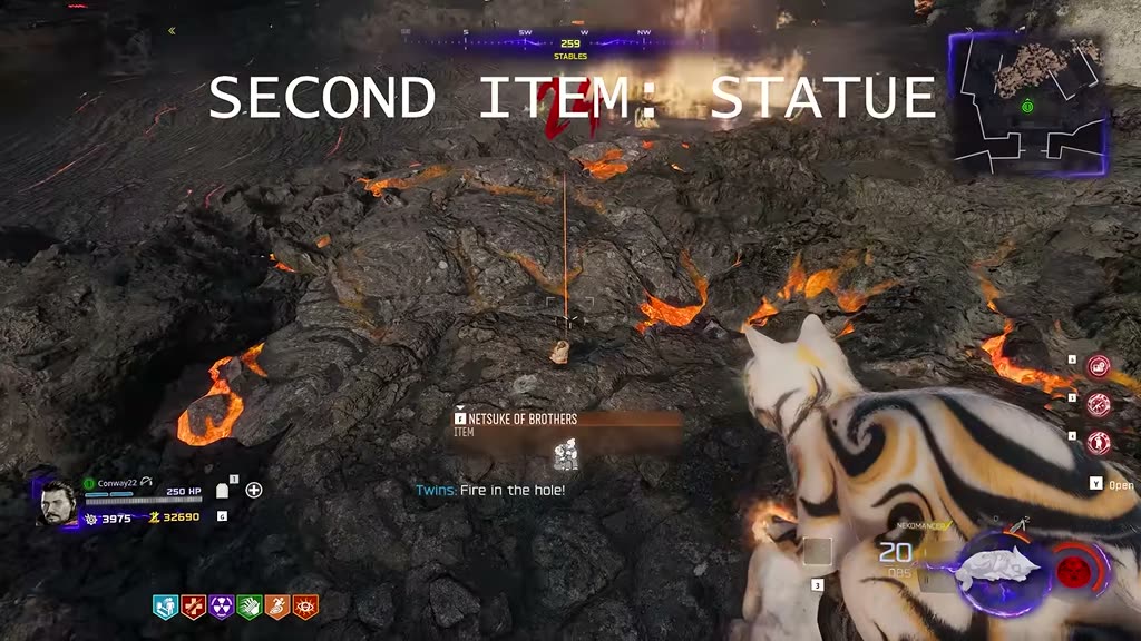 Picking up the dislodged statue from the cooled lava